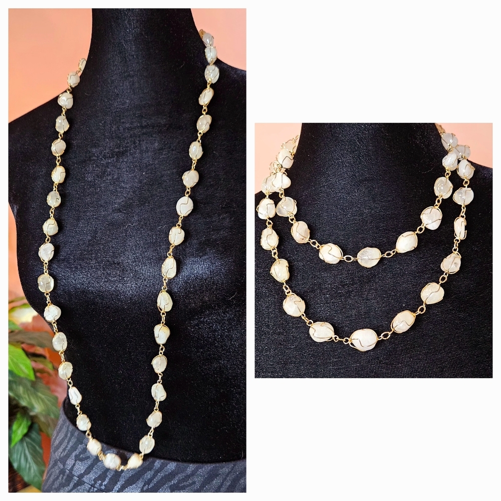 That rare Unic golden and ivory necklace can be elegantly folded into 2 strands